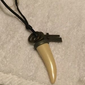 COPY - Man  hammers tooth necklace